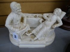 Parian ware group of two laughing clergymen seated by a table, titled 'A Capital Joke' (damages