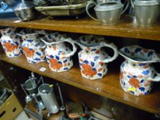 Set of five graduating Victoria Ironstone jugs