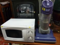 Daewoo white finish microwave oven and a Genie Express vac E/T