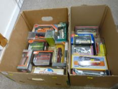 Two boxes of boxed Corgi and other model buses and coaches