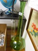 Large green glass bottle vase and one other