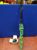 Daiwa boxed fishing reel and a fishing rod