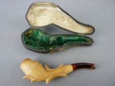 Carved Meerschaum pipe with amber mouthpiece in fitted case