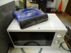 G-Tech cordless electronic sweeper and a white 700w microwave oven E/T