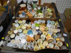 Good collection of porcelain eggcups and a quantity of animal and other figurines and similar items