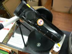 National Geographic night telescope and a small Luna 30x30 telescope on tripod stand