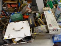 Plastic crate containing garage hand tools, hammers, grease guns, fixings, tile cutter, painted