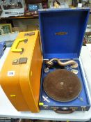 Wondertone picnic gramophone with winder and a vintage suitcase