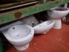 Bathroom suite of toilet, washbasin, bidet, bath, bath panel and small UPVC frosted glass door etc