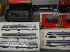 Six boxed and apparently unused model railway engines and two Southern Rail box sets, 00 and H0