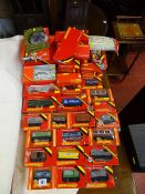 Large parcel of boxed Hornby Railways 00 gauge goods wagons, boxed town station, boxed goods shed