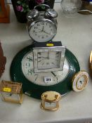 Collection of wall, mantel and alarm clocks