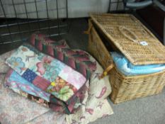 Lidded wicker basket, vintage quilted bed cover, modern patchwork example and one other