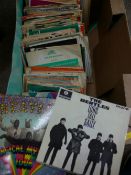 Box of vintage 45rpm records to include The Beatles 'Magical Mystery Tour', 1967 double sleeve and