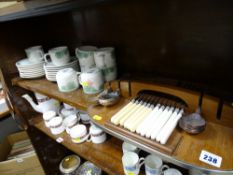 Retro cutlery holder with cutlery contents and a parcel of Noritake coffeeware