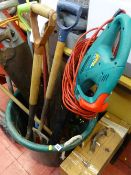 Large plastic garden bucket with contents of long handled garden tools, spirit level and manual saw,