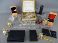Mixed box of collectables including a Black Foot 8x21 monocular, a quantity of glass fluid flasks in