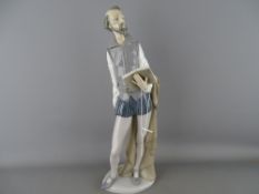 38 cms high Nao porcelain figurine of Don Quixote reading a book