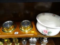Ship's style clock and barometer on a wooden plaque and a Price Kensington chamber pot