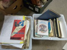 Two tubs of written music