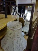 Onyx and brass standard lamp with shade and a dark wood framed mirror E/T