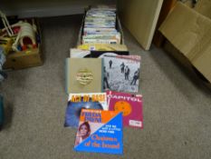 Box of 45rpm records including Ace of Bass, Barry White, Don Maclean and similar era