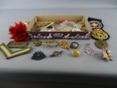 Collection of regimental badges and buttons etc including a Thomas Fattorini 'On War Service'