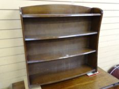 Polished wood four shelf bookcase