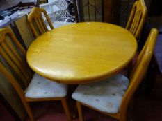 Modern circular breakfast table and four chairs