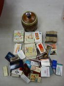 Polished tobacco jar, quantity of collector's cards, vintage matchboxes etc