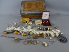 Indian carved wood and inlaid box and contents including a 1780 Mother Theresa thaler formed as a