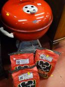 Weber portable garden BBQ with three bags of charcoal