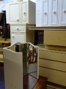Parcel of three bedside chests and a triple mirror