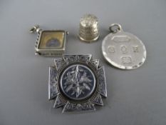 Hallmarked circular pendant and a silver compass fob, a sterling sewing thimble and a Victorian