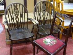 Two vintage wheelback armchairs and another chair