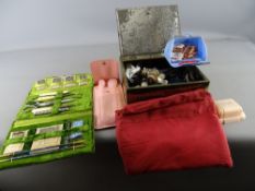 Huntley & Palmer's biscuit tin of buttons, a velvet cased sewing kit, an early plastic sewing kit