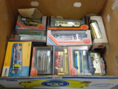 Box of diecast model buses, mainly in bubble packs including 'Exclusive First Editions' etc
