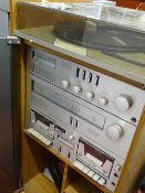 Vintage Amstrad stereo hifi unit with belt driven turntable E/T