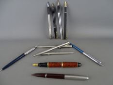 Collection of fountain and ballpoint pens including a Parker Slimfold with fourteen carat gold