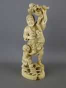 Well carved Meiji period Japanese Okimono of a smiling man and young boy teasing monkeys with