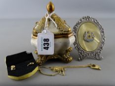 Modern urn shaped box and jewellery contents and a white metal easel ornament with crest centre '