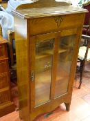 Small oak single door three shelf bookcase