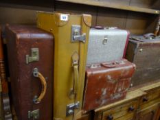 Five pieces of vintage luggage
