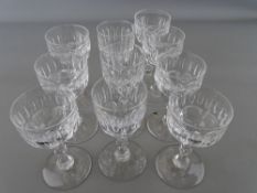 Ten vintage drinking glasses with facet cut stems