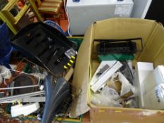 Box of various items including boxed contemporary LED bathroom light fittings, bike saddle, hole