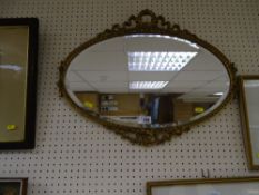 Garland decorated gilt framed wall mirror