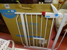 Boxed Carlson extra wide walk through child's gate with small pet door (boxed)