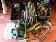 Two black tubs of garage items including grease guns and air driven power tools, quantity of hose