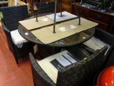 As new suite of conservatory/garden furniture to include circular topped table and four armchairs