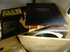 Box of LP records, various genres including The Eagles, Elvis Presley etc